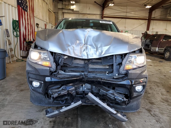2021 Chevrolet Colorado 4WD Z71 with VIN 1GCGTDEN5M1236807, listed as a Copart auction lot 88790435 with 80,095 mi miles and Salvage Title. Bid and sale history available at carsss.com. Image 5.