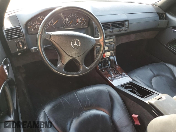 2001 Mercedes-Benz SL 500 with VIN WDBFA68FX1F196609, listed as a Copart auction lot 76124154 with 49,809 mi miles and Salvage title. Bid and sale history available at DreamBid. Image 8.