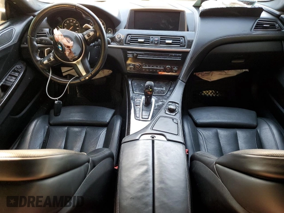 2014 BMW 6 Series 650i xDrive z VIN WBA6B4C54ED371520, wystawiony jako Copart lot #75107784 z przebiegiem 136 077 mil mil oraz Szkoda całkowita • Salvage title. Historia ofert i sprzedaży dostępna na DreamBid. Obrazek 8.