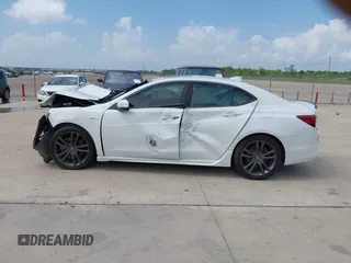 2019 Acura TLX w/A-Spec Pkg z VIN 19UUB2F62KA007114, wystawiony jako IAAI lot #42444291 z przebiegiem 164 795 mil mil oraz . Historia ofert i sprzedaży dostępna na DreamBid. Obrazek 14.