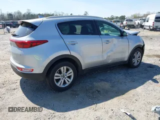 2018 Kia Sportage LX with VIN KNDPM3AC6J7422408, listed as a IAAI auction lot 41918342 with 104,385 mi miles and . Bid and sale history available at carsss.com. Image 4.