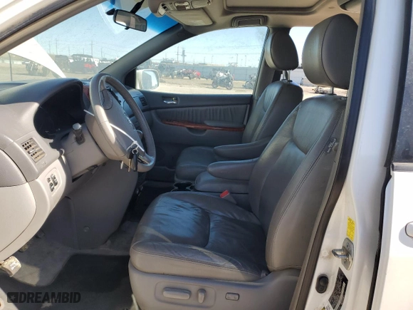 2010 Toyota Sienna XLE with VIN 5TDYK4CC8AS311023, listed as a Copart auction lot 47574285 with 209,186 mi miles and Salvage Title. Bid and sale history available at carsss.com. Image 7.
