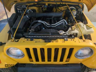 2004 Jeep Wrangler Sport z VIN 1J4FA49S64P751615, wystawiony jako Copart lot #55810895 z przebiegiem 128 165 mil mil oraz Szkoda całkowita • Salvage title. Historia ofert i sprzedaży dostępna na DreamBid. Obrazek 12.