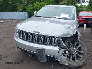 2019 Jeep Grand Cherokee Laredo E with VIN 1C4RJFAG5KC567003, listed as a IAAI auction lot 42390239 with 82,505 mi miles and . Bid and sale history available at DreamBid. Image 12.