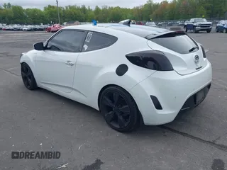 2012 Hyundai Veloster w/Gray Int with VIN KMHTC6AD6CU021176, listed as a IAAI auction lot 42205695 with 93,665 mi miles and . Bid and sale history available at DreamBid. Image 3.
