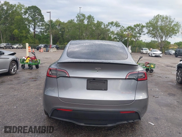 2024 Tesla Model Y Performance with VIN 7SAYGDEF3RA307468, listed as a IAAI auction lot 41805853 with 10,377 mi miles and . Bid and sale history available at DreamBid. Image 15.