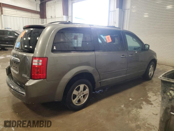 2010 Dodge Grand Caravan Hero with VIN 2D4RN3D12AR447193, listed as a Copart auction lot 52077085 with 178,885 mi miles and Non Repairable. Bid and sale history available at DreamBid. Image 3.