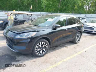 2020 Ford Escape SE Sport Hybrid with VIN 1FMCU9BZ4LUC25970, listed as a IAAI auction lot 42404984 with 102,651 mi miles and . Bid and sale history available at DreamBid. Image 2.