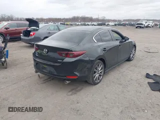 2019 Mazda 3 w/Select with VIN 3MZBPAAL4KM108590, listed as a IAAI auction lot 41726873 with 90,257 mi miles and . Bid and sale history available at carsss.com. Image 4.