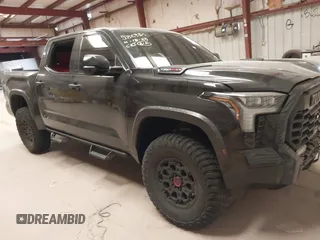 2023 Toyota Tundra TRD Pro Hybrid with VIN 5TFPC5DBXPX023320, listed as a IAAI auction lot 42064197 with 18,147 mi miles and . Bid and sale history available at DreamBid. Image 1.