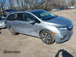 2018 Honda Odyssey Elite z VIN 5FNRL6H96JB004853, wystawiony jako IAAI lot #41877946 z przebiegiem 125 580 mil mil oraz . Historia ofert i sprzedaży dostępna na DreamBid. Obrazek 1.