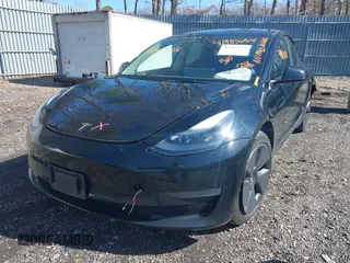 2023 Tesla Model 3 Long Range with VIN 5YJ3E1EB1PF392027, listed as a IAAI auction lot 41983638 with 31,415 mi miles and . Bid and sale history available at DreamBid. Image 18.