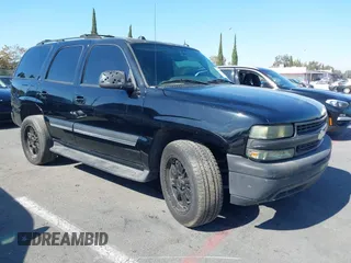 2004 Chevrolet Tahoe LS with VIN 1GNEC13T94J331286, listed as a IAAI auction lot 40691697 with 211,544 mi miles. Bid and sale history available at carsss.com. Image 1.