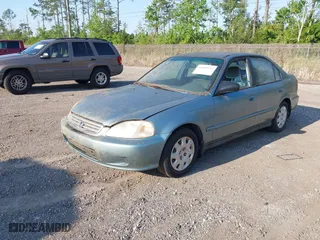 2000 Honda Civic VP with VIN 2HGEJ6616YH562841, listed as a IAAI auction lot 42009111 with 154,571 mi miles. Bid and sale history available at carsss.com. Image 17.