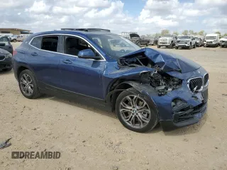 2022 BMW X2 xDrive28i with VIN WBXYJ1C01N5U27511, listed as a Copart auction lot 78460654 with 71,760 mi miles and Salvage Title. Bid and sale history available at carsss.com. Image 4.
