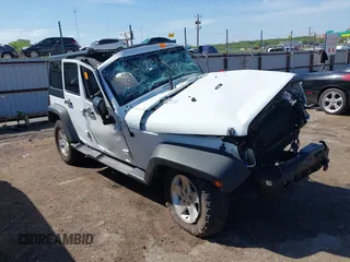 2018 Jeep Wrangler Unlimited Sport S z VIN 1C4HJWDGXJL856514, wystawiony jako IAAI lot #42097313 z przebiegiem Nie podano mil oraz . Historia ofert i sprzedaży dostępna na DreamBid. Obrazek 1.