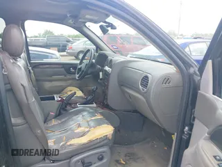 2004 GMC Envoy SLE with VIN 1GKDS13SX42398363, listed as a IAAI auction lot 42154134 with 308,001 mi miles and . Bid and sale history available at DreamBid. Image 5.