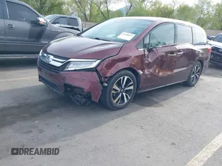 2018 Honda Odyssey Elite with VIN 5FNRL6H94JB067479, listed as a IAAI auction lot 42100911 with 160,174 mi miles and . Bid and sale history available at DreamBid. Image 2.