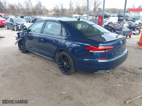 2021 Volkswagen Passat 2.0T R-Line with VIN 1VWMA7A35MC018415, listed as a IAAI auction lot 41908608 with 61,669 mi miles. Bid and sale history available at carsss.com. Image 3.