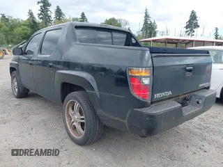 2006 Honda Ridgeline RTL with VIN 2HJYK16526H517466, listed as a IAAI auction lot 42737202 with 184,856 mi miles and . Bid and sale history available at DreamBid. Image 3.