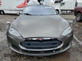 2015 Tesla Model S 85D with VIN 5YJSA1E20FF117464, listed as a Copart auction lot 54194515 with 99,446 mi miles and Clean Title. Bid and sale history available at carsss.com. Image 5.