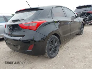 2015 Hyundai Elantra GT with VIN KMHD35LH3FU241149, listed as a IAAI auction lot 42163508 with 124,121 mi miles. Bid and sale history available at carsss.com. Image 4.