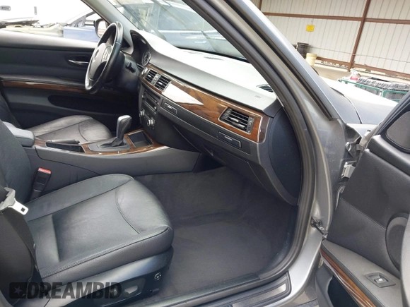 2011 BMW 3 Series 328i with VIN WBAPH5G52BNM84035, listed as a IAAI auction lot 42046301 with 165,418 mi miles. Bid and sale history available at carsss.com. Image 5.