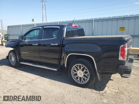 2021 GMC Canyon 4WD Denali with VIN 1GTG6EEN4M1221938, listed as a Copart auction lot 48760965 with 63,231 mi miles and Salvage Title. Bid and sale history available at carsss.com. Image 2.