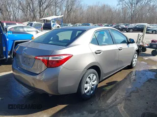 2015 Toyota Corolla L with VIN 5YFBURHE5FP345234, listed as a IAAI auction lot 41764976 with 221,888 mi miles and . Bid and sale history available at DreamBid. Image 4.