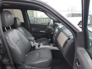 2011 Mercury Mariner with VIN 4M2CN8B7XBKJ01717, listed as a IAAI auction lot 42030587 with 115,766 mi miles. Bid and sale history available at carsss.com. Image 5.