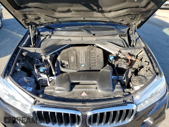2014 BMW X5 xDrive35d with VIN 5UXKS4C52E0J95994, listed as a Copart auction lot 85813704 with 137,107 mi miles and Salvage Title. Bid and sale history available at carsss.com. Image 12.