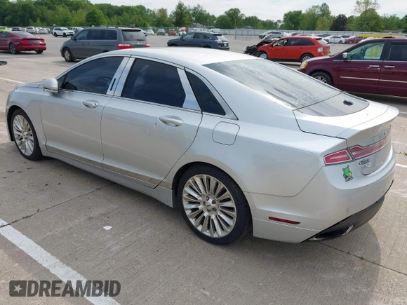 2013 Lincoln MKZ z VIN 3LN6L2G95DR828063, wystawiony jako IAAI lot #42398124 z przebiegiem 158 626 mil mil oraz . Historia ofert i sprzedaży dostępna na DreamBid. Obrazek 3.