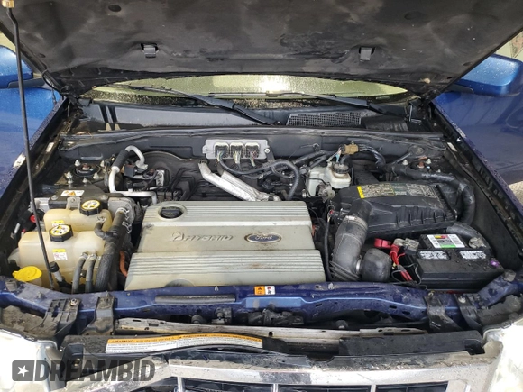 2008 Ford Escape Hybrid z VIN 1FMCU49H88KC22475, wystawiony jako Copart lot #56979175 z przebiegiem 213 622 mil mil oraz Nie do naprawy • Non repairable. Historia ofert i sprzedaży dostępna na DreamBid. Obrazek 13.