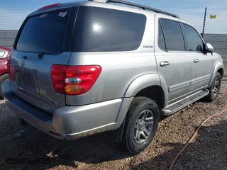 2001 Toyota Sequoia SR5 with VIN 5TDZT34A71S028573, listed as a IAAI auction lot 42061154 with 274,467 mi miles. Bid and sale history available at carsss.com. Image 4.