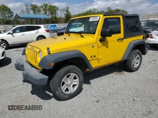 2009 Jeep Wrangler X with VIN 1J4FA241X9L765664, listed as a Copart auction lot 51802065 with 137,053 mi miles and Salvage Title. Bid and sale history available at DreamBid. Image 1.