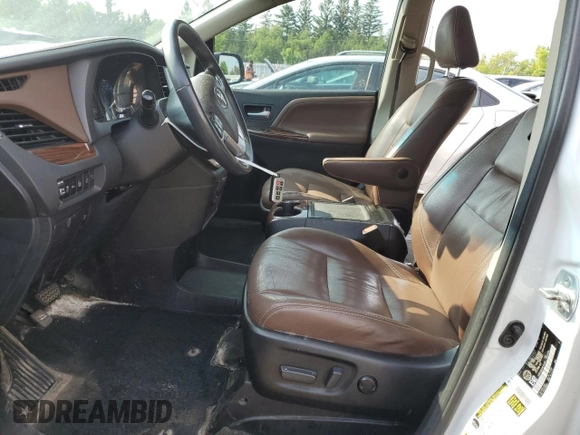 2017 Toyota Sienna XLE with VIN 5TDDZ3DCXHS154284, listed as a Copart auction lot 54932345 with 218,103 mi miles and Salvage title. Bid and sale history available at DreamBid. Image 7.