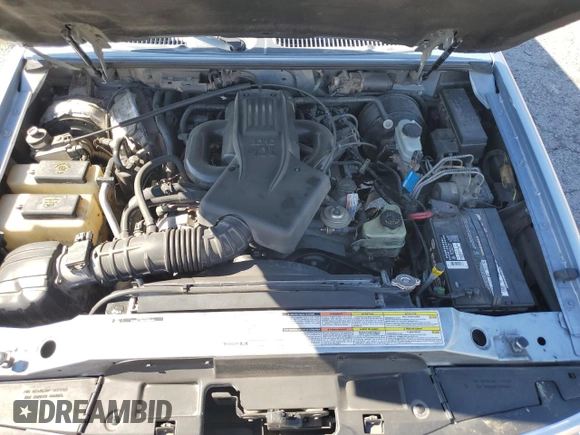 1998 Ford Explorer XL z VIN 1FMZU32E9WZB44586, wystawiony jako Copart lot #56432375 z przebiegiem 142 692 mil mil oraz Szkoda całkowita • Salvage title. Historia ofert i sprzedaży dostępna na DreamBid. Obrazek 12.