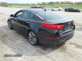 2014 Kia Optima SXL Turbo with VIN 5XXGR4A66EG307497, listed as a IAAI auction lot 42020082 with 134,736 mi miles and . Bid and sale history available at DreamBid. Image 3.