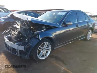 2014 Mercedes-Benz C-Class C 250 Sport with VIN WDDGF4HB1EG239751, listed as a IAAI auction lot 39149563 with 103,454 mi miles. Bid and sale history available at carsss.com. Image 2.