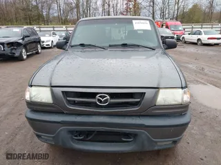 2005 Mazda B-Series 4WD Truck SE with VIN 4F4ZR47E15PM05750, listed as a IAAI auction lot 41850056 with 163,605 mi miles. Bid and sale history available at carsss.com. Image 12.