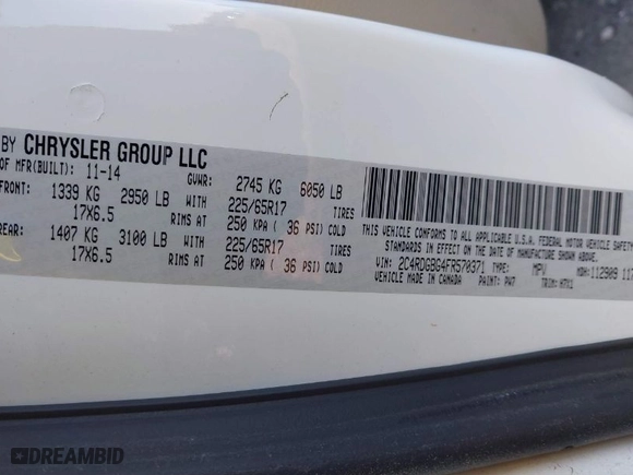 2015 Dodge Grand Caravan SE with VIN 2C4RDGBG4FR570371, listed as a IAAI auction lot 41766592 with 999,999 mi miles. Bid and sale history available at carsss.com. Image 9.