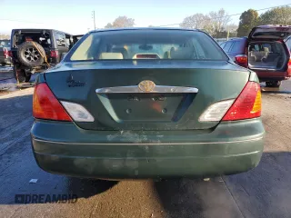 2001 Toyota Avalon XL z VIN 4T1BF28B81U162506, wystawiony jako Copart lot #52031805 z przebiegiem 212 437 mil mil oraz Szkody całkowita. Historia ofert i sprzedaży dostępna na DreamBid. Obrazek 6.