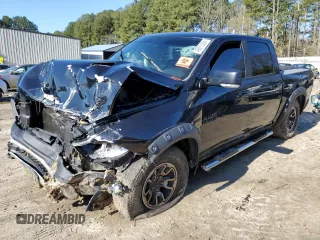 2015 Ram 1500 Rebel z VIN 1C6RR7YT7FS771791, wystawiony jako Copart lot #49873094 z przebiegiem 119 875 mil mil oraz Szkoda całkowita • Salvage title. Historia ofert i sprzedaży dostępna na DreamBid. Obrazek 1.