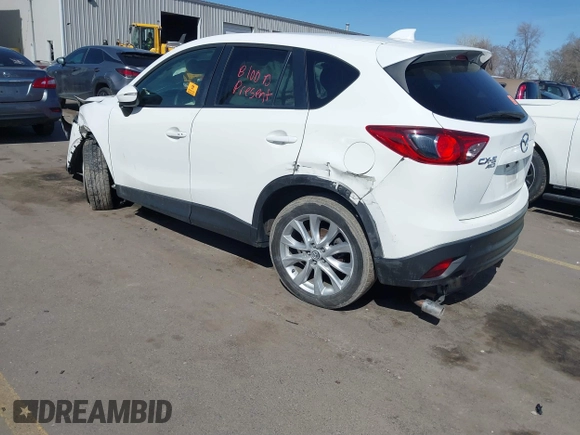 2015 Mazda CX-5 Grand Touring with VIN JM3KE4DY5F0526335, listed as a IAAI auction lot 41756046 with 1 mi miles. Bid and sale history available at carsss.com. Image 3.