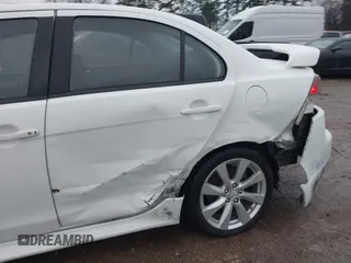 2015 Mitsubishi Lancer GT with VIN JA32U8FW5FU008618, listed as a IAAI auction lot 41290204 with 115,854 mi miles. Bid and sale history available at carsss.com. Image 6.