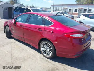 2014 Ford Fusion SE Hybrid with VIN 3FA6P0LU8ER253939, listed as a IAAI auction lot 41882200 with 241,178 mi miles. Bid and sale history available at carsss.com. Image 3.