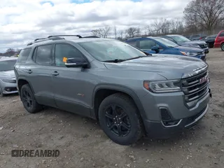 2021 GMC Acadia AT4 with VIN 1GKKNLLS2MZ208492, listed as a IAAI auction lot 42027057 with 87,745 mi miles. Bid and sale history available at carsss.com. Image 1.