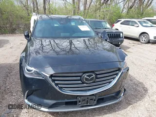 2020 Mazda CX-9 Grand Touring with VIN JM3TCBDY3L0419049, listed as a IAAI auction lot 41948393 with 70,163 mi miles and . Bid and sale history available at DreamBid. Image 17.