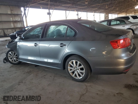 2012 Volkswagen Jetta SE z VIN 3VWDX7AJ3CM400209, wystawiony jako Copart lot #50618355 z przebiegiem 125 167 mil mil oraz Szkoda całkowita • Salvage title. Historia ofert i sprzedaży dostępna na DreamBid. Obrazek 2.