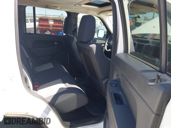 2009 Jeep Liberty Sport with VIN 1J8GN28K89W536182, listed as a IAAI auction lot 42086597 with 161,928 mi miles. Bid and sale history available at carsss.com. Image 7.